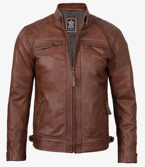 Brown leather jacket with quilted shoulders and multiple zippered pockets. It has a front zipper closure and a sleek, modern design.