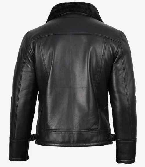 Back view of a stylish black leather jacket featuring a faux fur collar and a fitted silhouette, showcasing its sleek design.