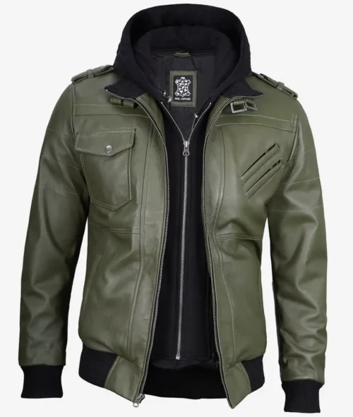 A green leather jacket with zippered front, epaulettes, and black ribbed cuffs. It features a black hood, cargo pockets, and diagonal chest zippers.