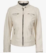 A stylish beige leather jacket with a high collar and zip closure. It features quilted shoulders and four zippered pockets, conveying a modern, sleek look.