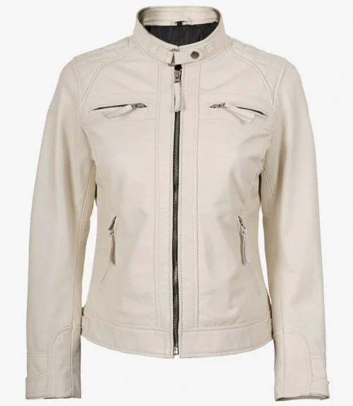 A stylish beige leather jacket with a high collar and zip closure. It features quilted shoulders and four zippered pockets, conveying a modern, sleek look.