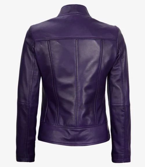 A deep purple leather jacket viewed from the back, featuring a fitted design with vertical seam lines. The fabric appears smooth and glossy.