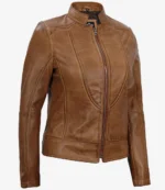 Brown leather jacket with a sleek design, featuring a front zipper, high collar, and fitted tailoring. The tone is classic and sophisticated.