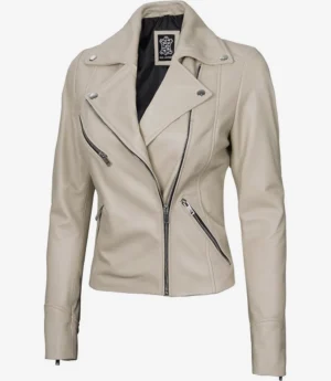 Beige leather biker jacket with a sleek design, featuring multiple zippered pockets and silver snap buttons. The jacket exudes a trendy, edgy vibe.