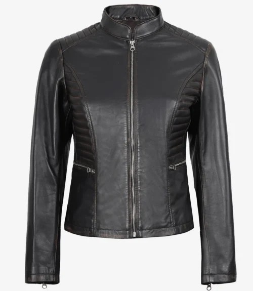 Open black leather jacket showing inner lining with a pocket and a "Real Leather" label. The jacket hangs slightly open, revealing smooth texture.