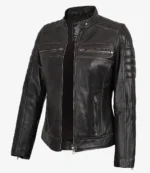 A sleek, black leather jacket with a stand-up collar, front zippers, and padded detailing on the shoulders and upper arms, exuding a stylish, edgy vibe.