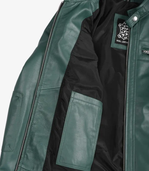 Open green leather jacket with visible black lining and multiple pockets. The label reads Real Leather, indicating genuine material. Casual and stylish.