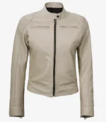 Beige leather jacket with a high collar, front zipper, and minimalist design. The jacket has two chest pockets and a sleek, modern look.