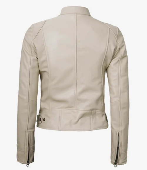 Alt text: Back view of a beige leather jacket with a high collar and adjustable waist tabs. It features long sleeves with zippers, creating a sleek, modern look.