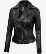 A sleek black leather biker jacket with silver zippers, a wide lapel, and a belt at the waist. The jacket conveys a bold, edgy style.