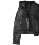 Black leather jacket shown open, displaying a smooth inner lining and external zipped pocket. The sleek design conveys a stylish, modern feel.
