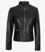 Black leather jacket with a front zipper, quilted shoulder design, and zipped pockets, conveying a sleek and edgy style against a white background.