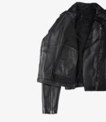 A black leather jacket with an open front exposing the interior, featuring a zippered sleeve and sleek design. The image exudes a cool, edgy vibe.