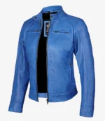 Blue leather jacket with a sleek design, featuring a stand-up collar, front zipper, and two zippered chest pockets. It conveys a modern, stylish tone.