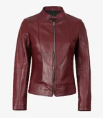 A maroon leather jacket with a front zipper and a stand collar, displayed. The sleek design conveys a stylish and modern feel.