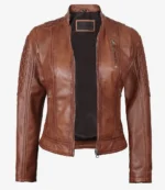 Brown leather jacket with quilted shoulders and zippered pockets, open to reveal a black interior. The jacket has a sleek, stylish design.