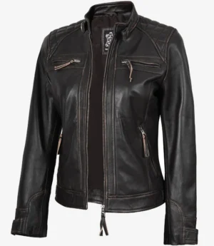 Dark brown leather jacket with quilted shoulders and multiple zippers. The jacket is shown on a white background, highlighting a sleek and edgy style.