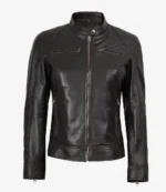 A stylish black leather jacket with a high collar, front zipper, and zippered pockets. The sleek design and smooth texture convey a modern, edgy tone.