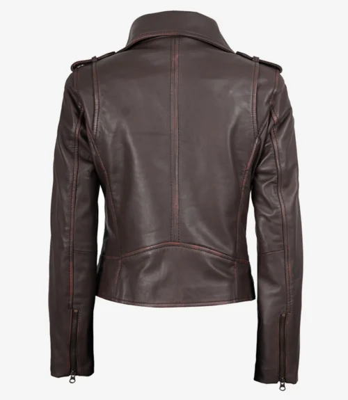 Brown leather jacket viewed from the back, featuring a high collar, stitched detailing, shoulder straps, and zippers on the cuffs, on a plain background.