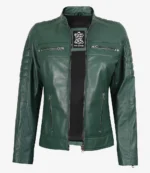 Green leather jacket with silver zippers on chest and pockets, standing in a neutral posture. The tag inside displays a logo and Real Leather.