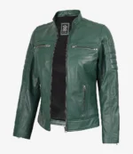 Green leather jacket with a sleek design, featuring front zippers and pockets. The jacket has a modern, edgy look, exuding a stylish and bold vibe.