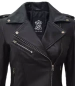 Black leather motorcycle jacket with asymmetrical zippers, metal snaps, and a textured finish. It features a bold, edgy style, exuding a cool, rebellious vibe.