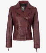 Maroon leather jacket with a front zipper and two zippered pockets. It has a classic biker style, exuding a bold and stylish vibe.