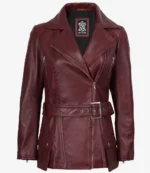 Burgundy leather jacket with a wide collar, asymmetrical zipper, and belted waist. Features include zipper pockets and a logo patch inside, exuding a bold, stylish tone.