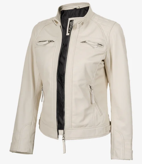 Cream leather jacket with a high collar, front zipper, and four zippered pockets. The interior is lined in black, conveying a modern, stylish look.