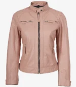 Blush pink leather jacket with a high collar and zip front. Quilted shoulder design, zippered pockets, and fitted sleeves create a chic, edgy look.