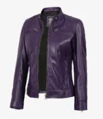 Purple leather jacket with zipper pockets and a standing collar against a plain white background, conveying a sleek and stylish look.