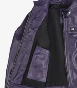 Purple leather jacket partially open, revealing a black interior lining. The jacket has a zipper and snap closure with a sleek, modern design.