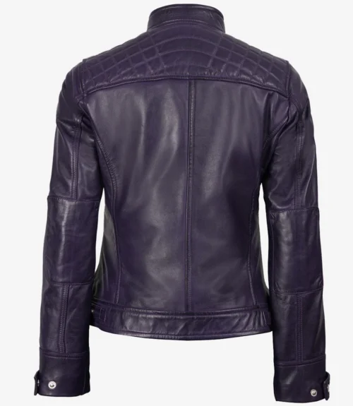 A sleek purple leather jacket shown from the back. It features quilted shoulder detailing, structured seams, and a high collar, conveying a modern and edgy style.