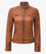 Brown leather jacket with quilted shoulder details, front zipper, and zippered pockets. Stylish and rugged design, set against a plain white background.