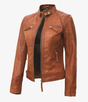 Brown leather jacket with a modern, sleek design, featuring a stand-up collar, front zipper, and multiple zippered pockets, exuding a stylish, edgy vibe.