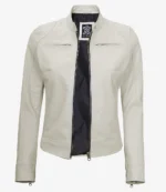 white leather jacket with a front zipper, two zippered chest pockets, and a black interior lining, conveying a sleek and stylish appearance.