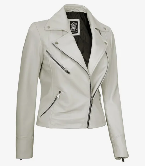 White leather jacket with a stylish asymmetric zipper front, silver accents, and zipper detailing. The sharp collar adds a modern, edgy touch.