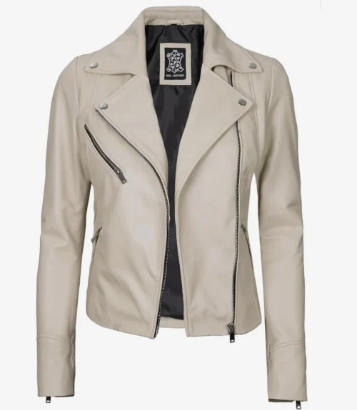 A cream-colored leather jacket with an asymmetrical zipper, silver buttons, and side pockets. The interior lining is black, conveying a sleek, modern style.