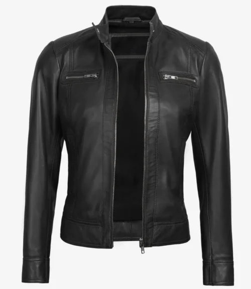 Black leather jacket with a sleek, fitted design on a plain white background. Features zippered chest pockets and a stand-up collar, exuding an edgy, modern vibe.