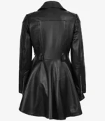 Back view of a sleek, black leather coat with a flared skirt. The coat features a tailored fit, prominent stitching, and zippered sleeves, exuding a stylish and edgy tone.