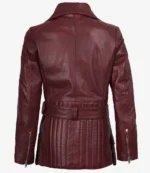 Burgundy leather jacket shown from the back, featuring a belted waist, zippered cuffs, and vertical stitching details for a sleek, modern look.