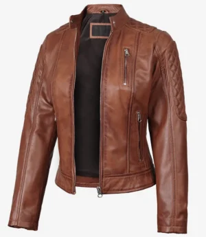 Brown leather biker jacket with a sleek design and quilted shoulders. Features multiple zippered pockets and a front zipper, projecting a stylish, edgy vibe.