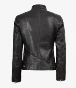 Black leather jacket shown from the back. It features detailed stitching, a high collar, and zippered cuffs, conveying a sleek, stylish look.