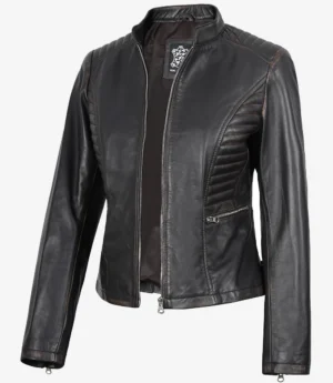 Black leather jacket with quilted shoulder and side panels, silver zippers on the front and a side pocket, exuding a sleek and edgy tone.