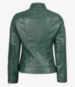Green leather jacket displayed from the back, featuring detailed stitching, quilted elbow patches, and zipped cuffs. The design is sleek and modern.