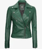 Green leather jacket with silver zippers, featuring a notched collar and asymmetrical front. The style conveys a bold, edgy fashion statement.