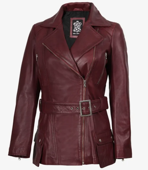 Deep burgundy leather jacket with a wide collar, belted waist, and zipper details, conveying a sleek and stylish look.