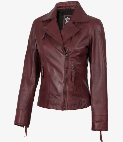 Maroon leather jacket with asymmetrical front zippers and a wide collar. The sleek design and deep color give it a stylish, edgy look.