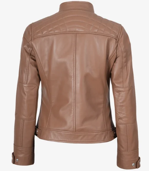 Brown leather jacket seen from the back, featuring quilted shoulders and detailed stitching. The style is sleek with a modern, polished look.