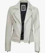 A white leather jacket with a black lining is shown. It features silver zippers on the front and pockets, with a sleek and modern design.